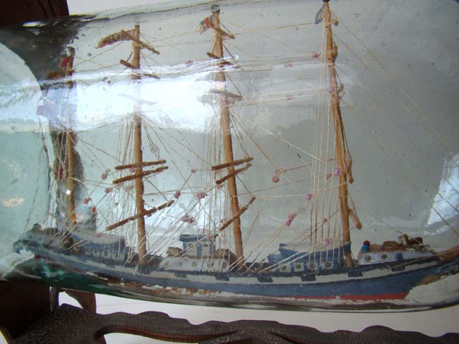 A fine 19th century Ship in a Bottle mounted in a carved fretwork stand circa 1880-1900 — image 3